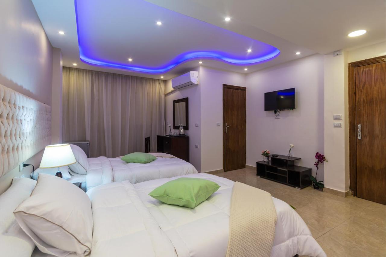 Amon Holiday Pyramids Inn Kafret el-Gabal المظهر الخارجي الصورة