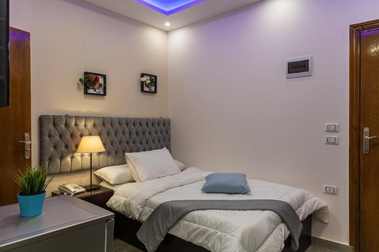 Amon Holiday Pyramids Inn Kafret el-Gabal المظهر الخارجي الصورة