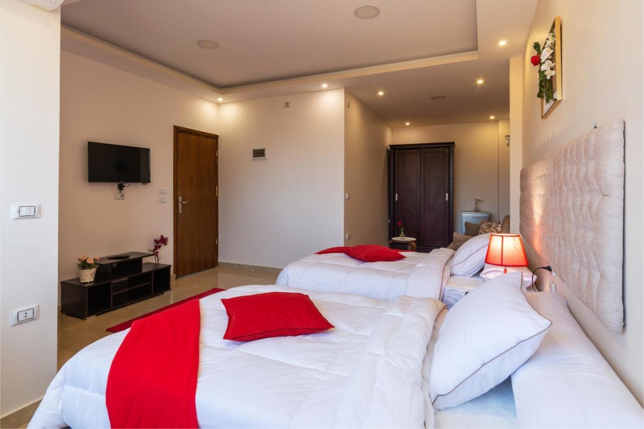 Amon Holiday Pyramids Inn Kafret el-Gabal المظهر الخارجي الصورة