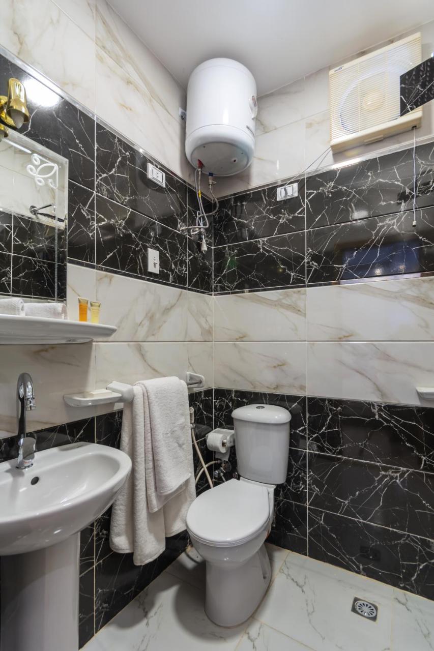 Amon Holiday Pyramids Inn Kafret el-Gabal المظهر الخارجي الصورة