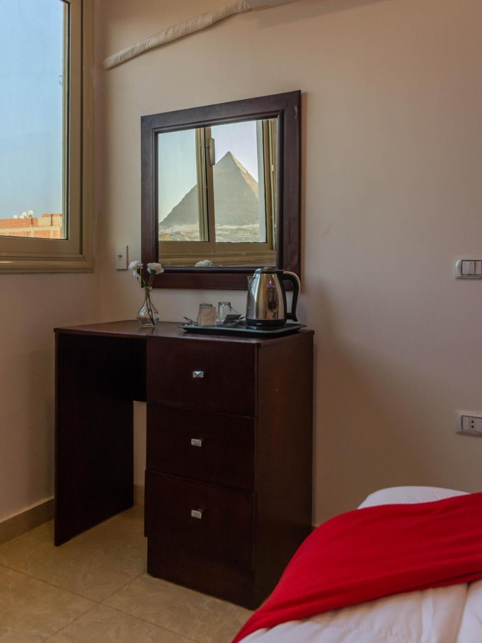 Amon Holiday Pyramids Inn Kafret el-Gabal المظهر الخارجي الصورة