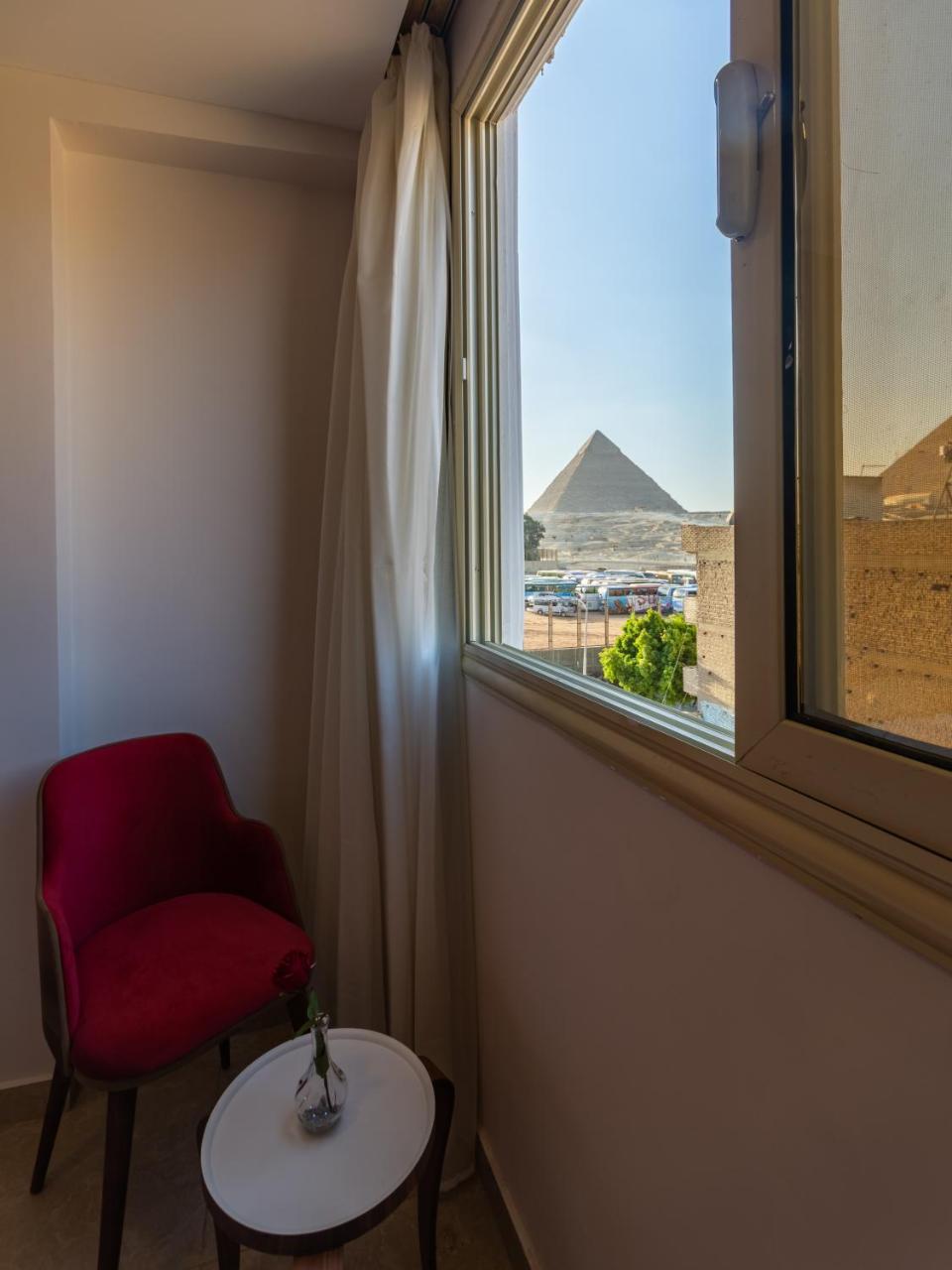 Amon Holiday Pyramids Inn Kafret el-Gabal المظهر الخارجي الصورة