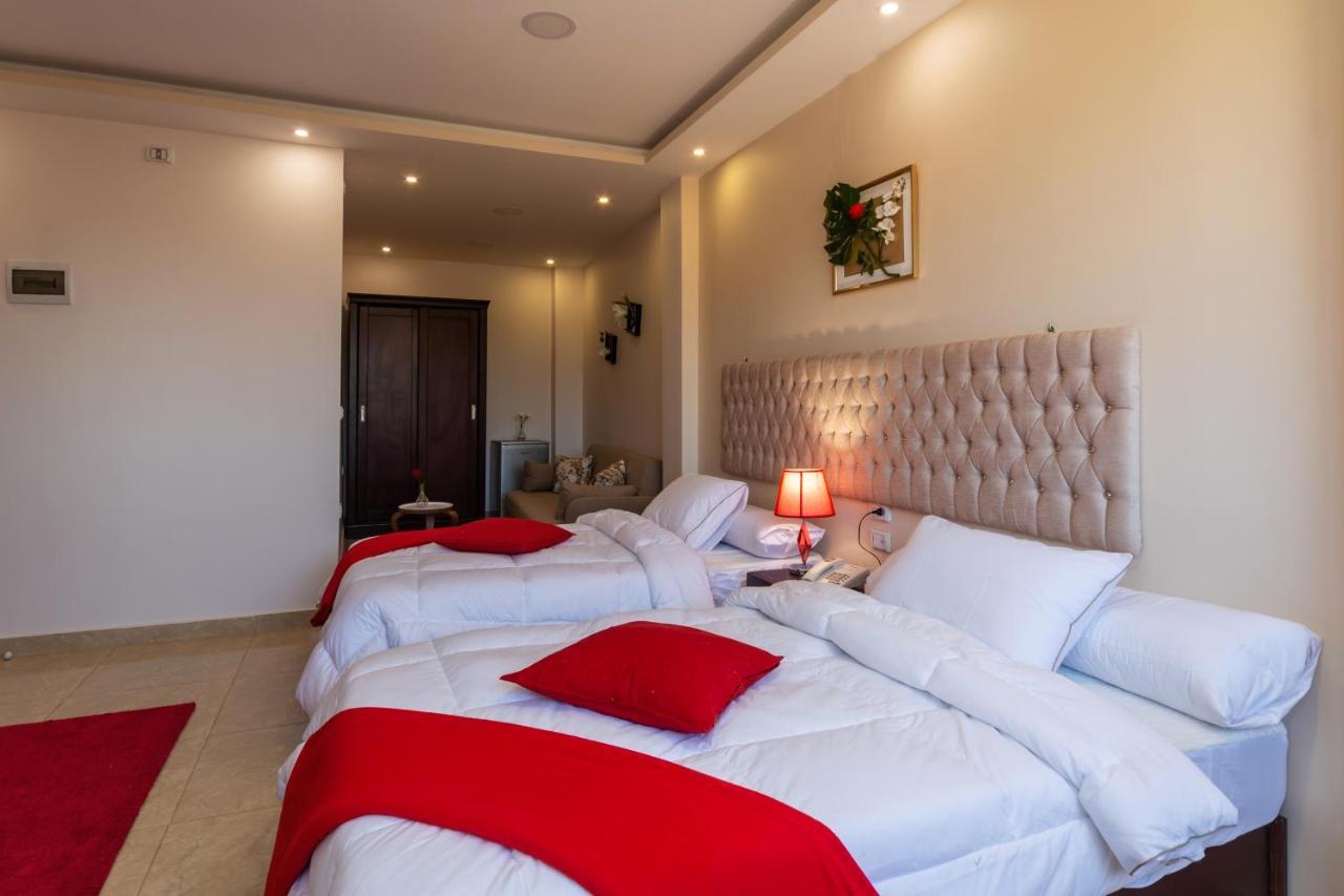 Amon Holiday Pyramids Inn Kafret el-Gabal المظهر الخارجي الصورة