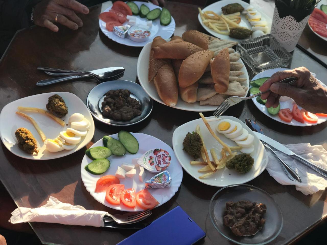 Amon Holiday Pyramids Inn Kafret el-Gabal المظهر الخارجي الصورة