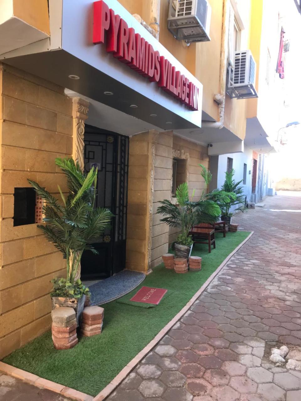 Amon Holiday Pyramids Inn Kafret el-Gabal المظهر الخارجي الصورة